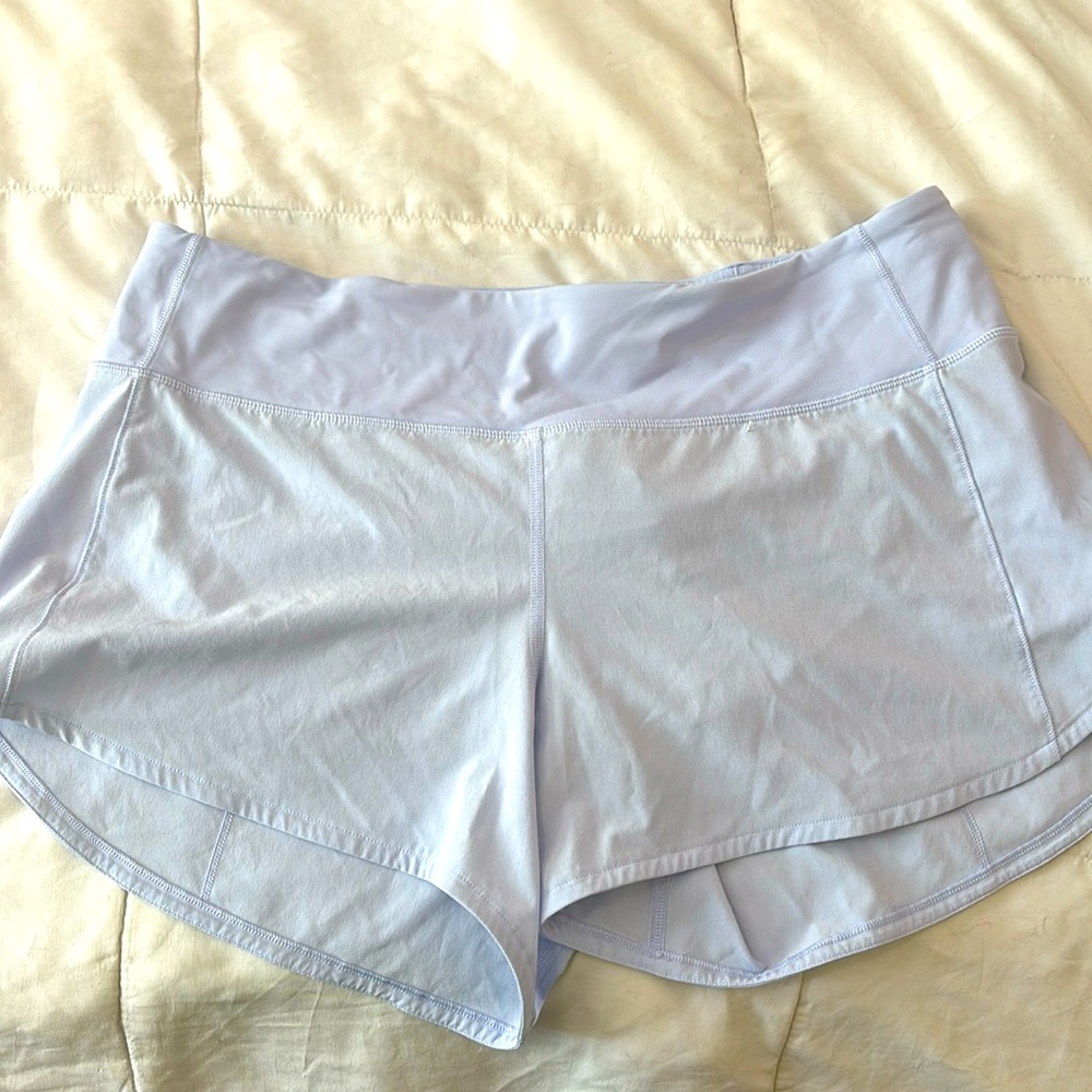 Lululemon Speed Ups size 10. VGUC 4 inch inseam, high rise